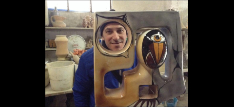 "Giuseppe Menozzi nel suo atelier." 